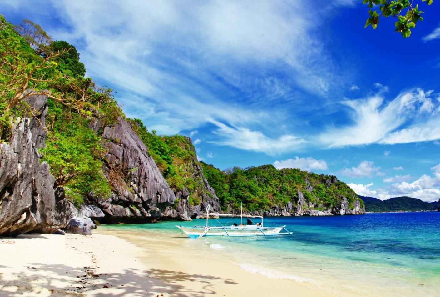 Mbg Travellers Inn Powered By Cocotel Puerto Princesa Екстериор снимка