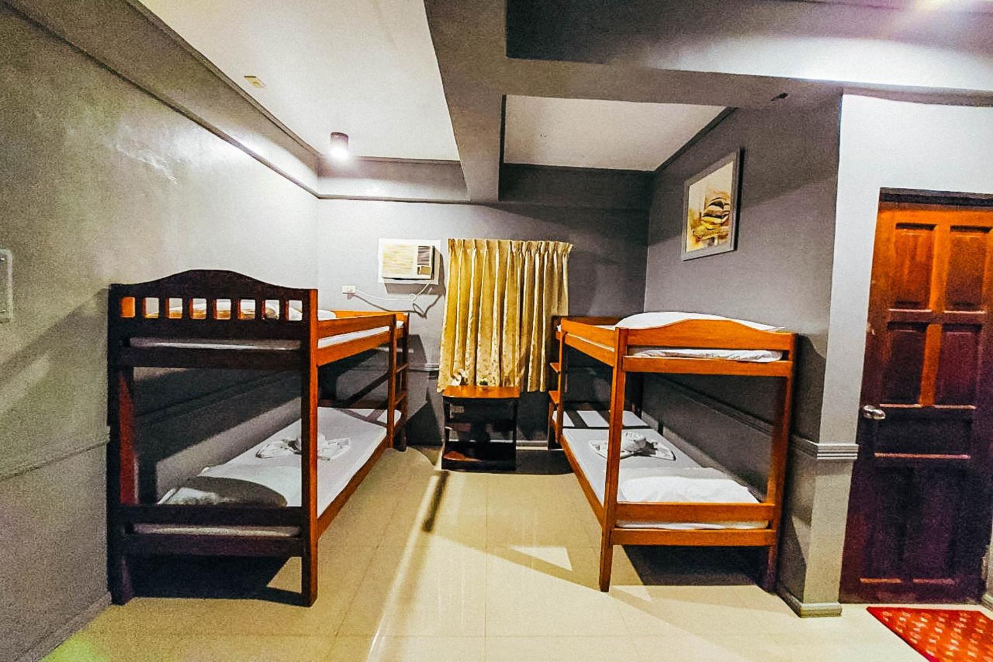 Mbg Travellers Inn Powered By Cocotel Puerto Princesa Стая снимка