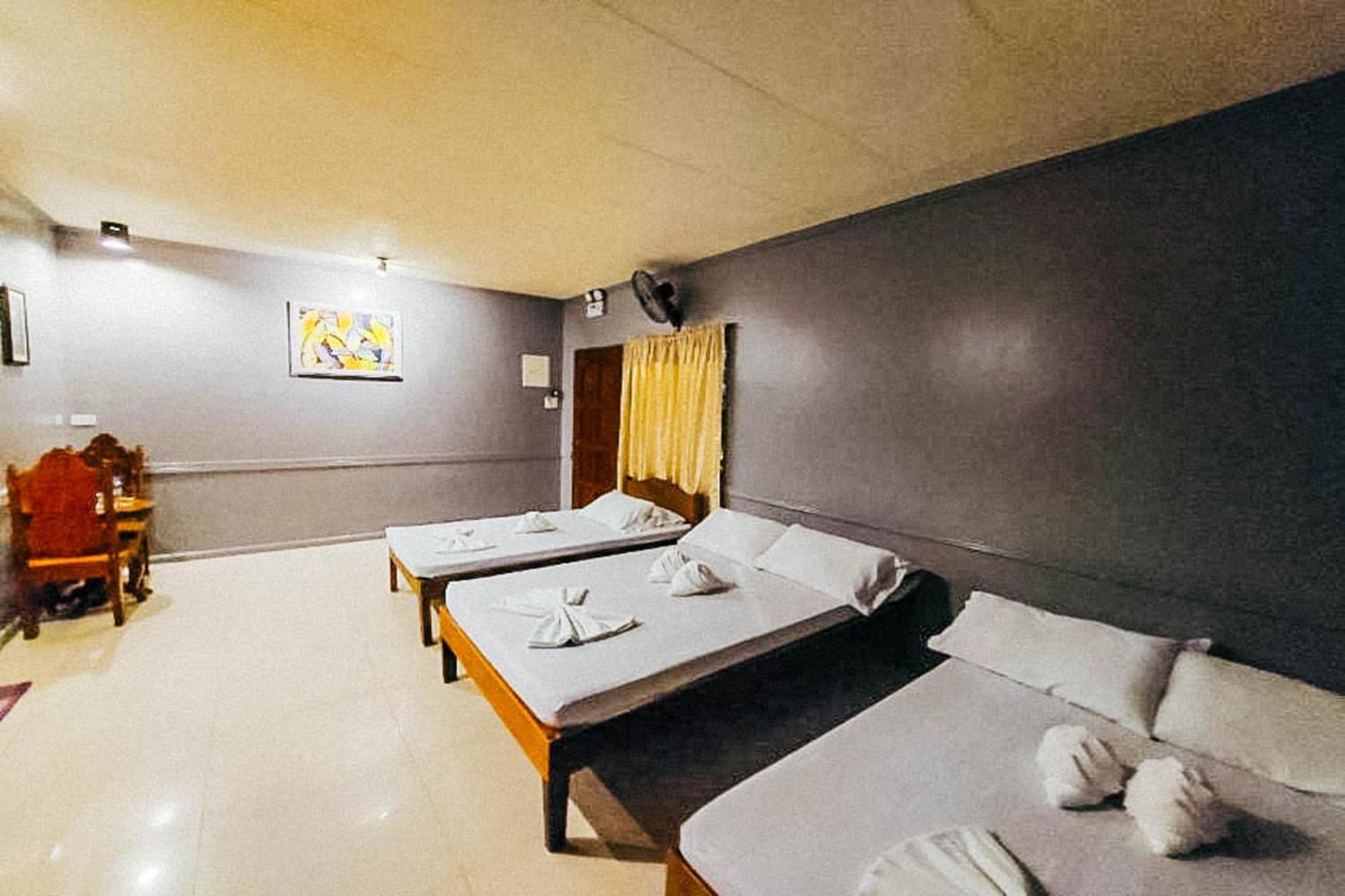 Mbg Travellers Inn Powered By Cocotel Puerto Princesa Стая снимка
