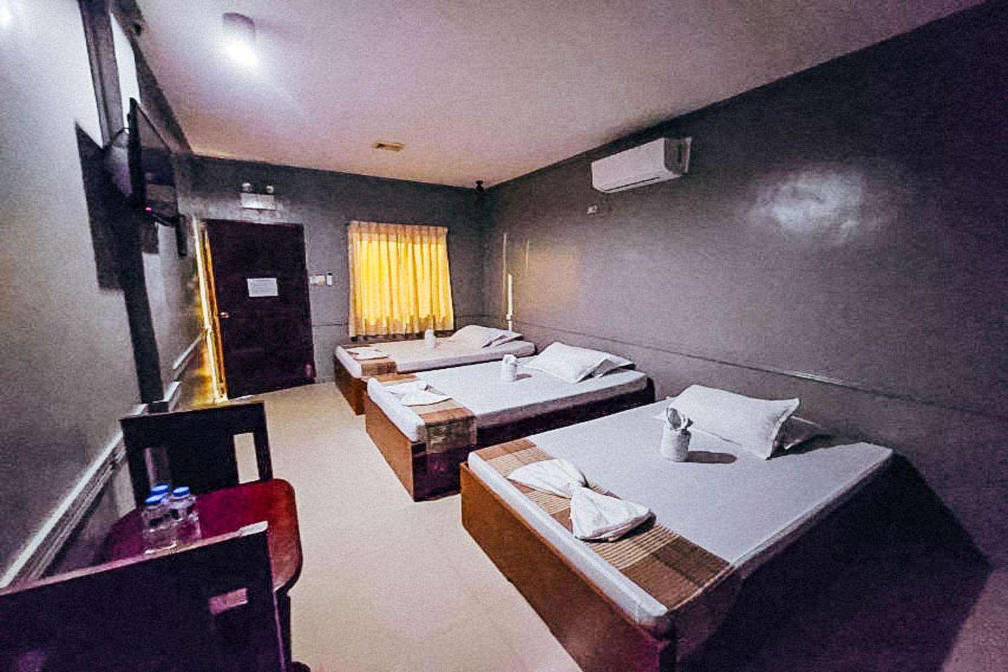 Mbg Travellers Inn Powered By Cocotel Puerto Princesa Стая снимка