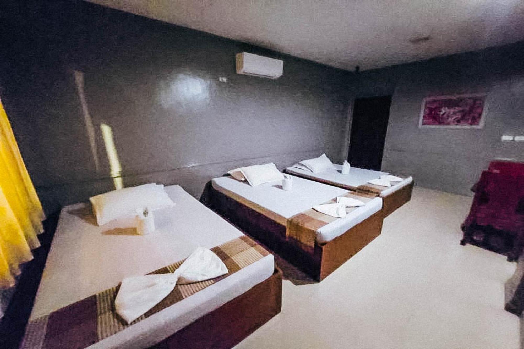 Mbg Travellers Inn Powered By Cocotel Puerto Princesa Стая снимка