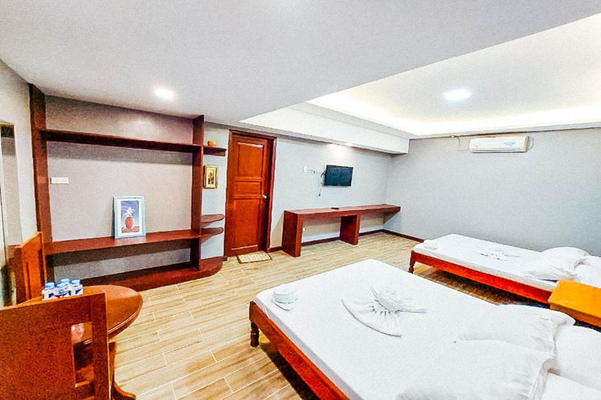 Mbg Travellers Inn Powered By Cocotel Puerto Princesa Стая снимка