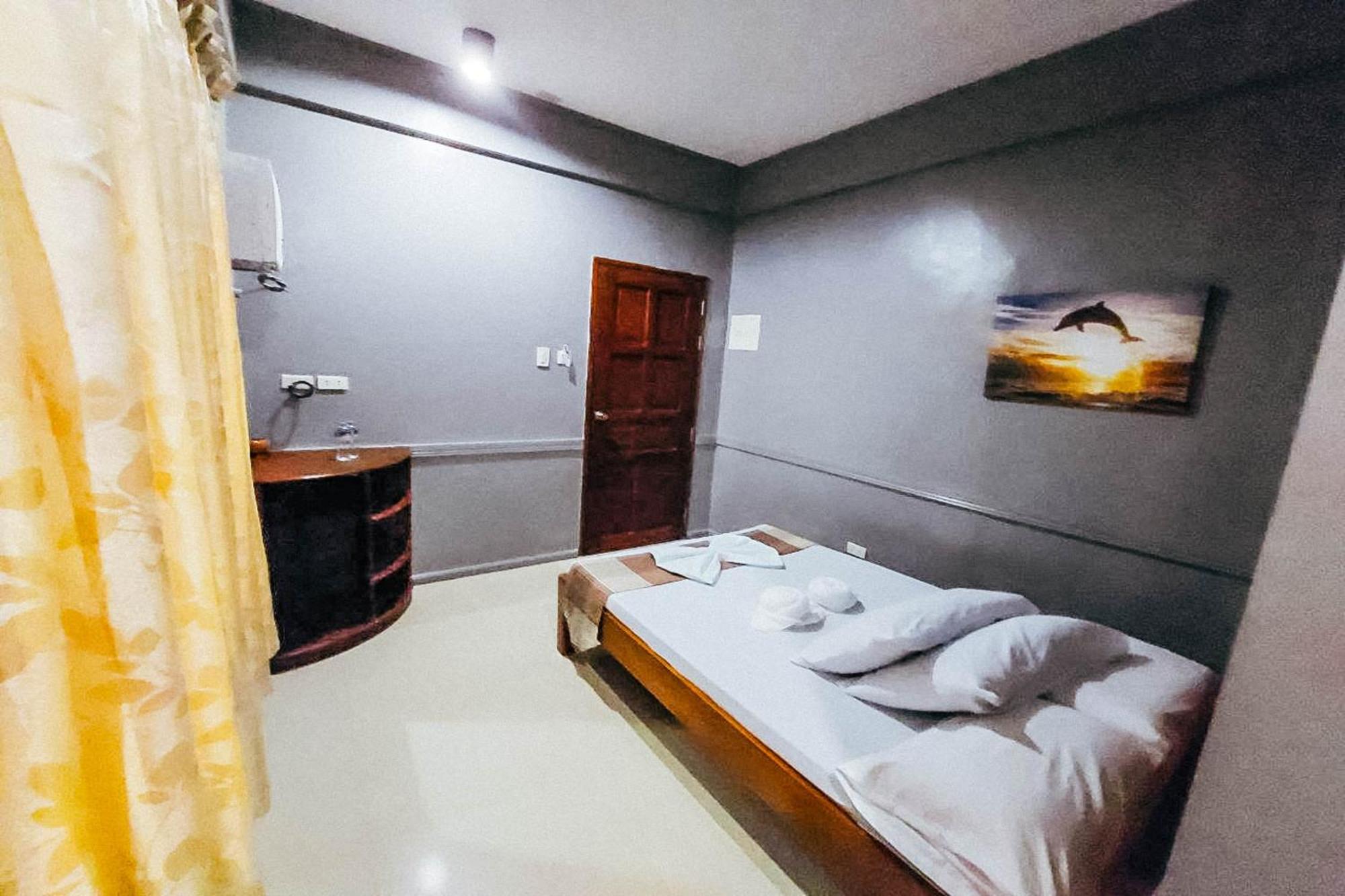 Mbg Travellers Inn Powered By Cocotel Puerto Princesa Стая снимка