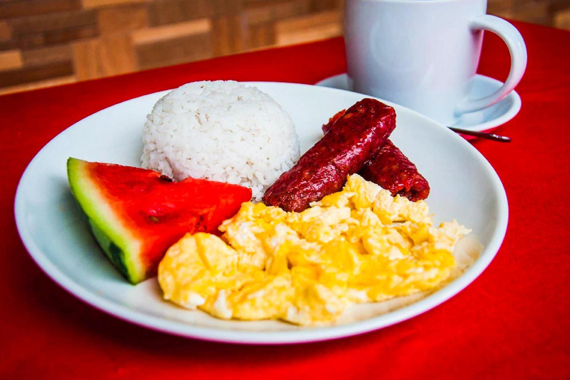 Mbg Travellers Inn Powered By Cocotel Puerto Princesa Екстериор снимка