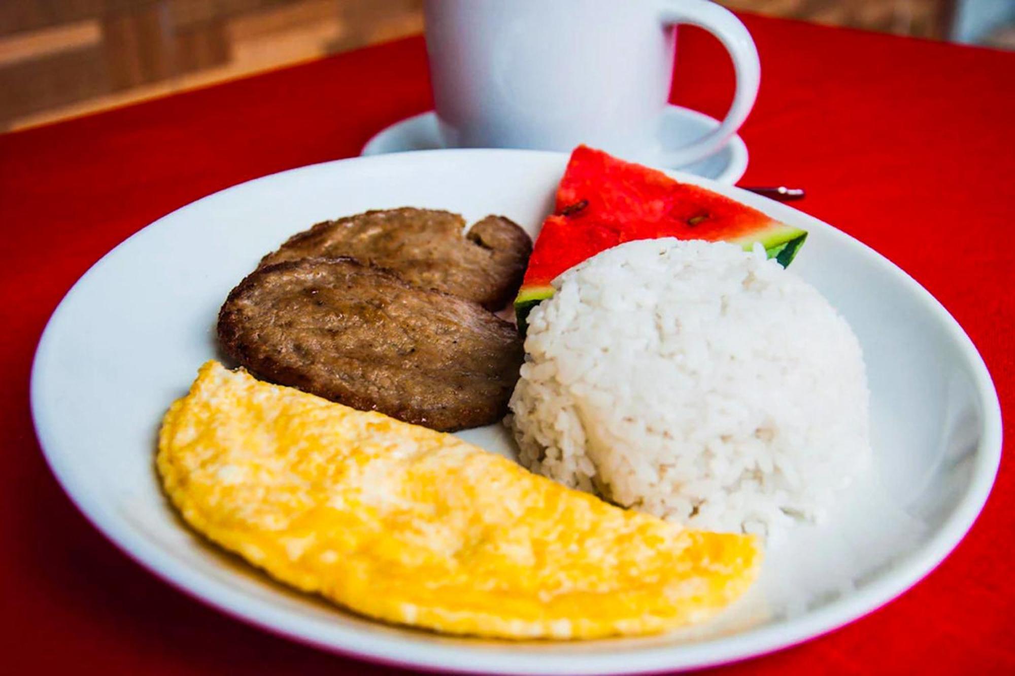 Mbg Travellers Inn Powered By Cocotel Puerto Princesa Екстериор снимка